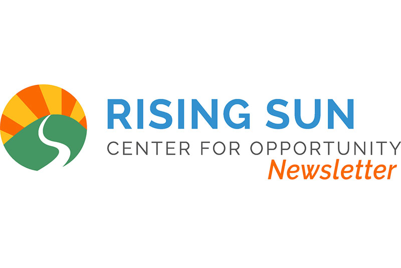 Rising Sun Cetner for Opportunity logo in blue, orange, green and yellow